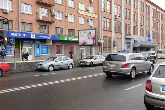 Фото рекламной плоскости по адресу Мельникова вул., ст.метро"Лукьяновская": напротив завода им. Артема (в напр. Михайлівської пл.)