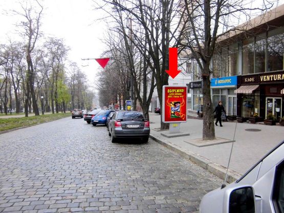 Фото рекламной плоскости по адресу Яворницкого пр. (бывш. Маркса пр.) / Вернадского ул. (бывш. Дзержинского ул.), 1-3