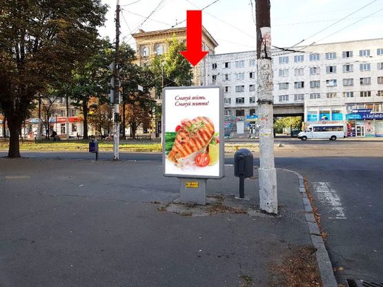 Фото рекламной плоскости по адресу Привокзальная ул. / Яворницкого пр. (бывш. Маркса пр.), 105