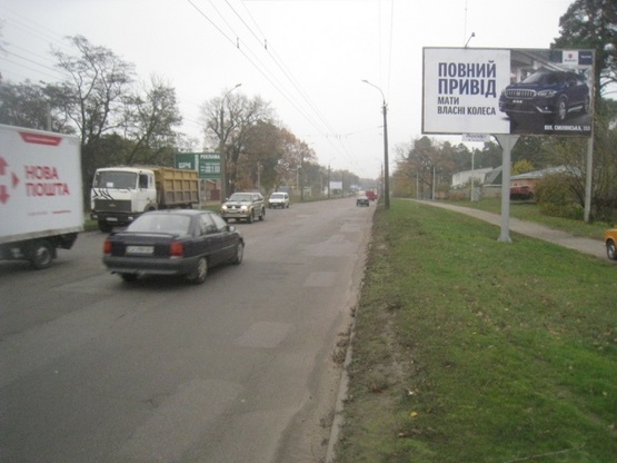 Фото рекламної площини за адресою Дахновская ул., 4 (рядом Больница №2, супермаркет, боулинг-цент, гостиница), направл. к центру города