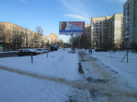 Фото рекламной плоскости по адресу Громова ул., 29/2 - Кооперативная ул., (Почта №36, Паб "BierLoga", продуктовый магазин, парикмахерская "Шик"), направ. в центр города