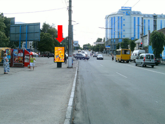 Фото рекламной плоскости по адресу Соборная ул. (бывш. 50-летия Октября ул.) / Б. Перспективная ул. (бывш. Маркса ул.), возле моста через р. Ингул, из центра