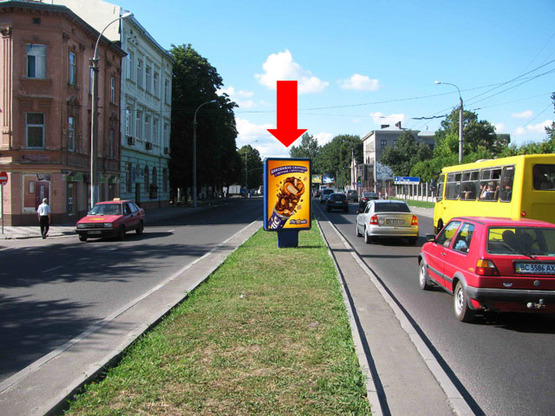 Фото рекламної площини за адресою Черновола пр. / Детько ул., разделитель, из центра