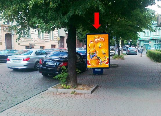 Фото рекламной плоскости по адресу Мудрого Я. ул., возле магазина "Золото"