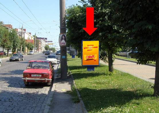 Фото рекламной плоскости по адресу Главная ул., 124 / Гончарова ул., возле фабрики "Импульс", из центра