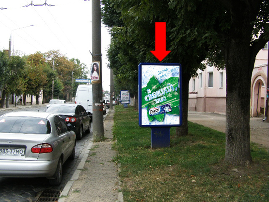 Фото рекламной плоскости по адресу Главная ул., 102 / Щербанюка ул. (бывш. Чапаева ул.), из центра