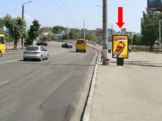 Фото рекламной плоскости по адресу Соборная ул. (бывш. 50-летия Октября ул.) / Б. Перспективная ул. (бывш. Маркса ул.), возле моста через р. Ингул, в центр