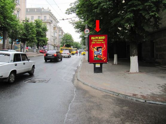 Фото рекламной плоскости по адресу Шевченко ул. / Б. Перспективная ул. (бывш. Маркса ул.), 32/34, возле магазина "Люкс"