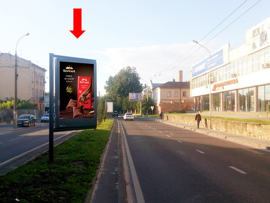 Фото рекламной плоскости по адресу Черновола пр. / Медовая ул., разделитель, возле клуба "Malevych", из центра