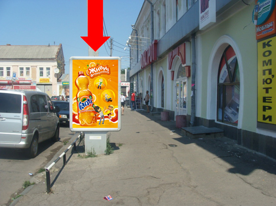 Фото рекламної площини за адресою Шевченко ул. / Новий Базар ул., 1, Центральный рынок, возле магазина "Обувной Бум"