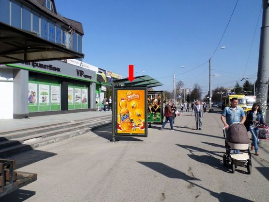 Фото рекламной плоскости по адресу Киевская ул., остановка "Школа №12", возле ОЦ "Политон", из центра, B1