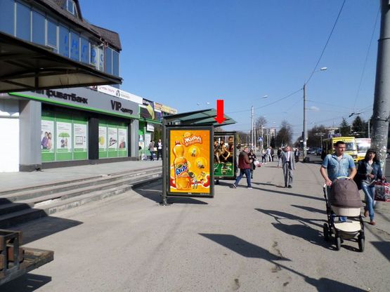 Фото рекламной плоскости по адресу Киевская ул., остановка "Школа №12", возле ОЦ "Политон", из центра, B2