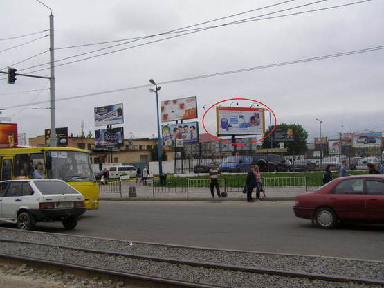 Фото рекламной плоскости по адресу Городоцька  К9 (  напроти привокзального ринку, до приміського вокзалу)