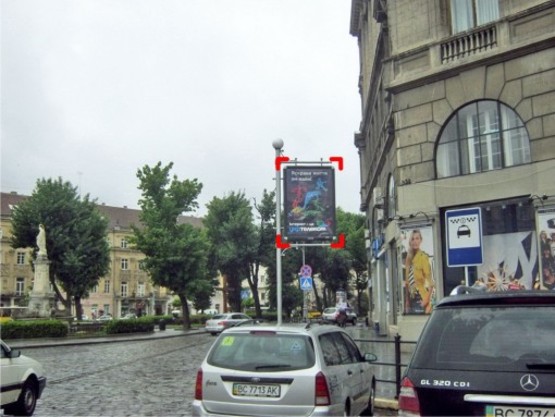 Фото рекламной плоскости по адресу пл. Міцкевича (біля Будинку Книги), місце 1