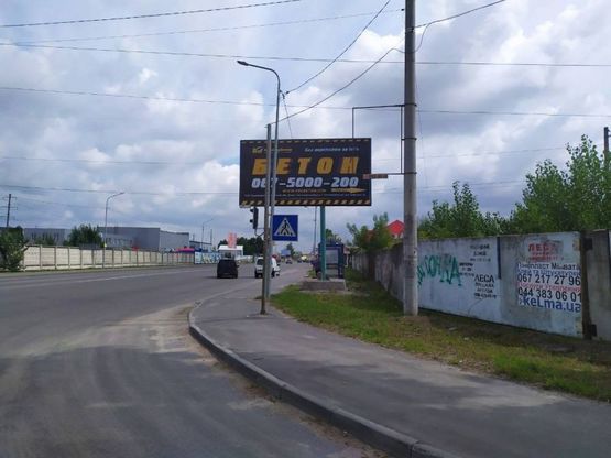 Фото рекламной плоскости по адресу с. Святопетровское, перекресток асфальтный завод