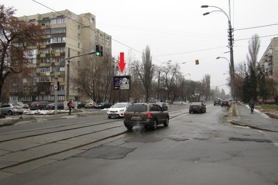 Фото рекламної площини за адресою Кирилловская ул. (Фрунзе ул.), 89 - ул. Хвойки В., (ОщадБанк, Библиотека им. О.Копиленка, стадион "Спартак", СШ№114), направ. ул. О.Телиги