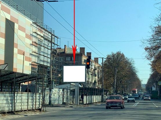 Фото рекламной плоскости по адресу s059B7,вул. Титова, 32А, біля ТЦ АПОЛЛО, рух у бік просп. О.Поля, на світлофорі