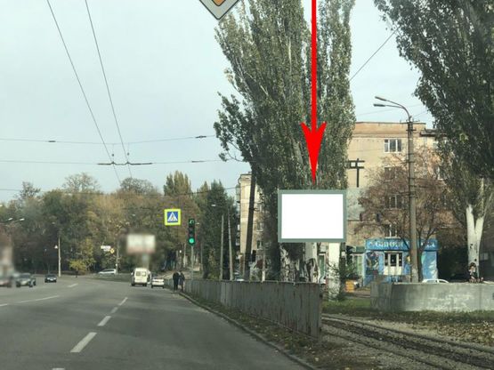 Фото рекламной плоскости по адресу t018A3,просп. Гагаріна, поворот до ТРЦ "Материк", біля світлофора