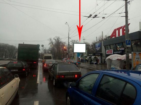 Фото рекламной плоскости по адресу t066A6,просп. Олександра Поля - просп. Пушкіна, біля "АТБ", біля світлофора