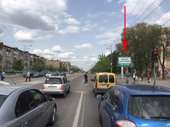 Фото рекламной плоскости по адресу t126A6,просп. Слобожанський, 68/Б, біля  ТЦ "Океан", на світлофорі