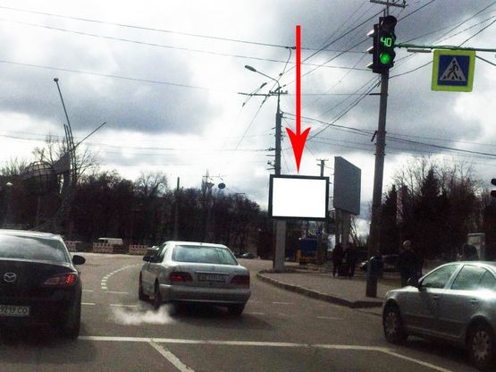 Фото рекламной плоскости по адресу t156A7,Запорізьке шосе, в районі буд. 4, біля ТРЦ "Дафі", на світлофорі