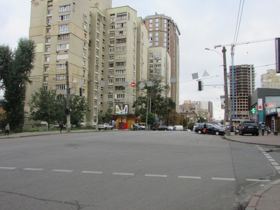 Фото рекламної площини за адресою Антоновича (Горького), 124/128,  зупинка "Володимирський ринок" (світлофор)