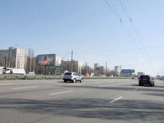 Фото рекламной плоскости по адресу Кільцева дорога / вулиця Тулузи (розподілювач), навпроти "Борщагівський ринок", рух в напрямку до Жулянського шляхопроводу