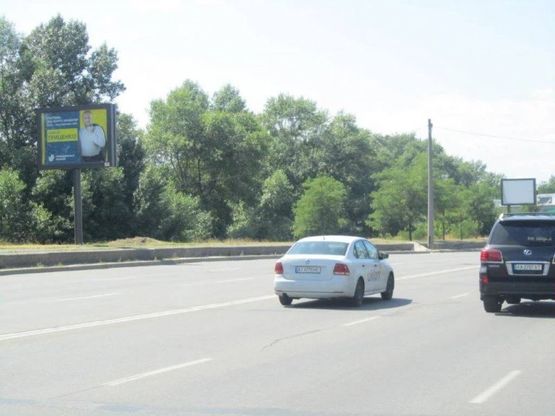 Фото рекламной плоскости по адресу Днепровская наб., 200 м от перекр. Здолбуновской