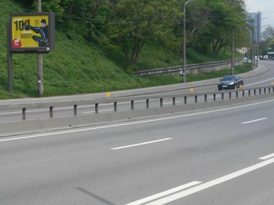 Фото рекламной плоскости по адресу Телиги О. ул. 500 м от Подольского моста к Петровке