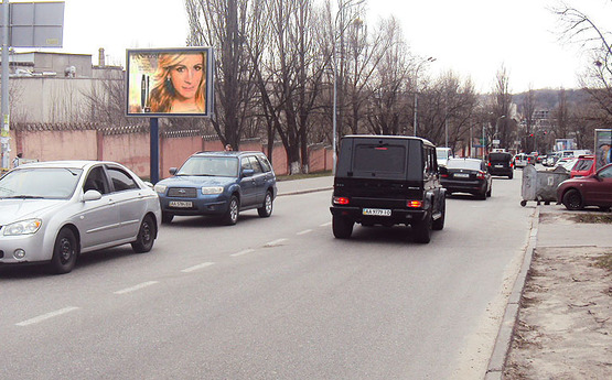Фото рекламной плоскости по адресу Ул.Щорса,16/20 (В1) СКРОЛЛЕР/Эко Маркет,Марфин Банк- На Ул Красноармейская