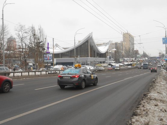 Фото рекламной плоскости по адресу бул. Дружбы Народов,21