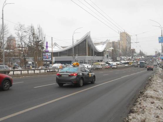 Фото рекламной плоскости по адресу бул. Дружбы Народов,21