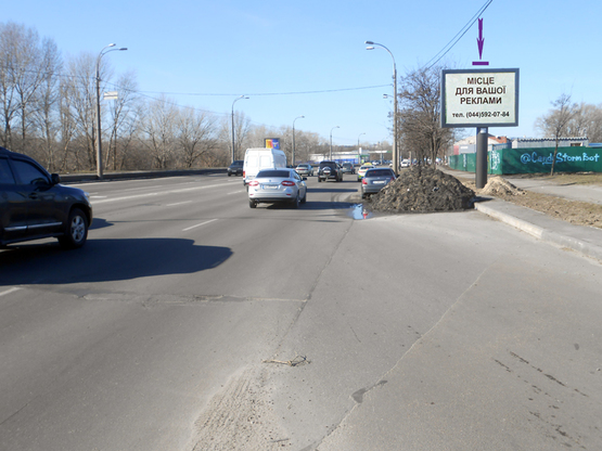 Фото рекламной плоскости по адресу Дніпровська Набережна, суп-т "Новус", на світлофорі,