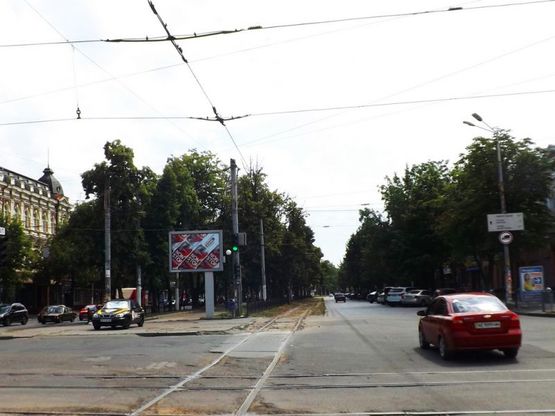 Фото рекламной плоскости по адресу пр.Д.Яворницького - вул.Шмідта/пр.К.Маркса - ул.Шмидта, центр города, рынок Озерка