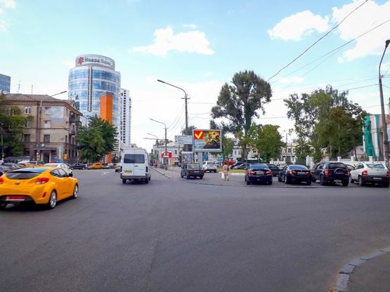 Фото рекламной плоскости по адресу вул. Коцюбинського - пл. Успенська,"Новий Центр", роллер 3,14х2,32/ул. Коцюбинского - пл. Д. Бедного,"Новый Центр", роллер 3,14х2,32, Центральный мост