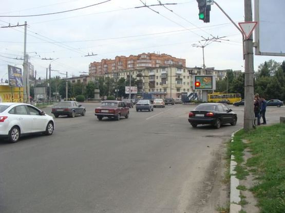 Фото рекламной плоскости по адресу пл.Зыгина (на треугольнике) с ул.Зеньковская