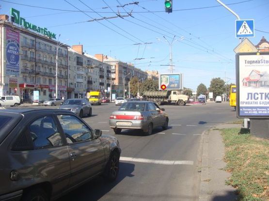 Фото рекламной плоскости по адресу Кооп.универ.(из центра)