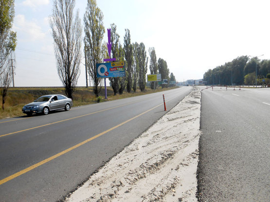 Фото рекламной плоскости по адресу Обуховская трасса 22км - Лисники - в направлении Обухова