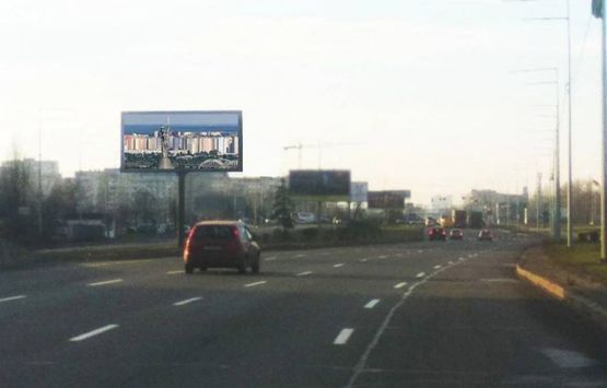 Фото рекламной плоскости по адресу Ватутіна/400м від ринку "Троєщина,на Північний (Московський) міст (розподілювач) (А3) СКРОЛЛЕР