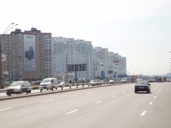 Фото рекламной плоскости по адресу Николая Бажана проспект / Бориса Гмыри, 1/2-въезд