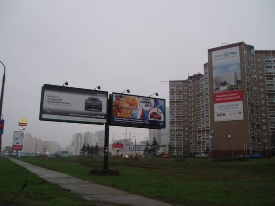 Фото рекламной плоскости по адресу Николая Бажана проспект / Бориса Гмыри, 1/2-въезд