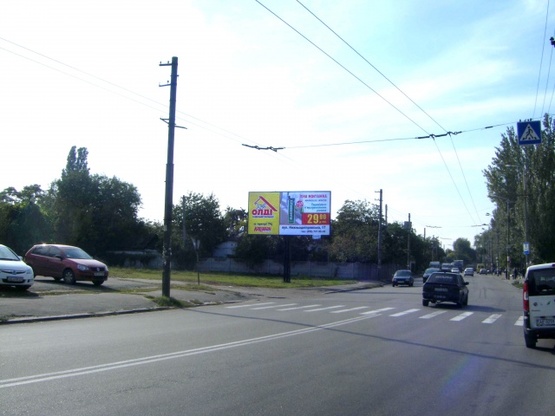 Фото рекламной плоскости по адресу Мануйловский просп. (Воронцова просп.), напротив дома №32, (Роддом №9, Приемная Амур-Нижнеднепровского района, Стадион Коминтерна), в направл. просп. Газеты "Правда"