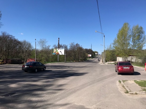 Фото рекламної площини за адресою Славы бульв. - жилой масив "Сокол 2", (перекресток), УкрСибБанк, маркет "АТБ", клуб "Сокол", в направл. ул. Паникахи