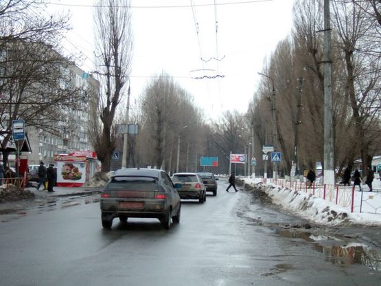 Фото рекламної площини за адресою вул.Проскурівського підпілля (Олімпійська). неподалік: зупинка, ринок, скупчення МАФів, супермаркет "Вопак" (в центр)