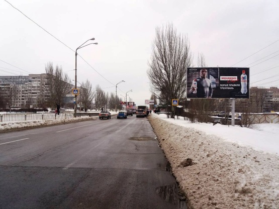 Фото рекламной плоскости по адресу Донецкое шоссе, 110 на пересечении с просп.Мира, (маркет "АТБ", ПриватБанк, шиномонтаж, маркет "VARUS"), в направл. ул. Совхозной