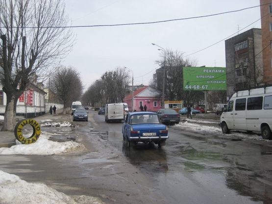 Фото рекламной плоскости по адресу ул. Домбровского 2а (ТЦ Дастор, м-т Эко)