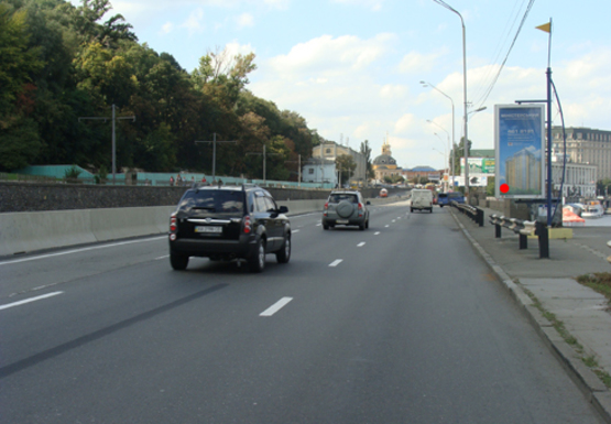 Фото рекламной плоскости по адресу Набережное шоссе (эл. опора № 8-9)