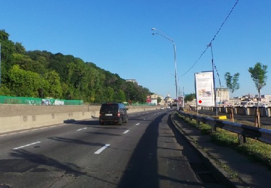 Фото рекламной плоскости по адресу Набережное шоссе (эл. опора № 9-10)