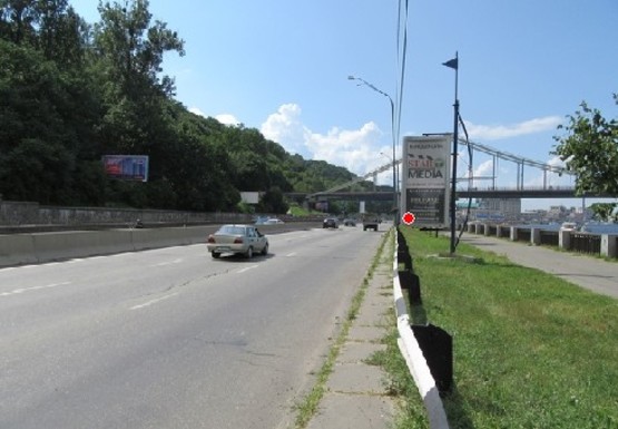 Фото рекламной плоскости по адресу Набережное шоссе (эл. опора № 14-15)