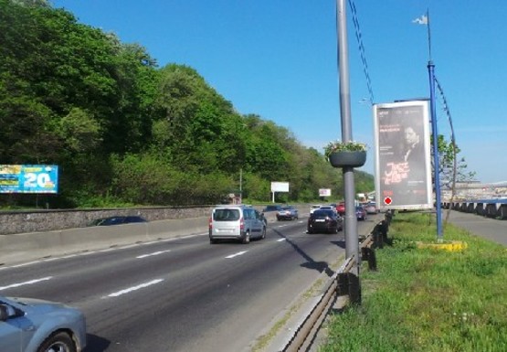 Фото рекламної площини за адресою Набережное шоссе (эл. опора № 21)